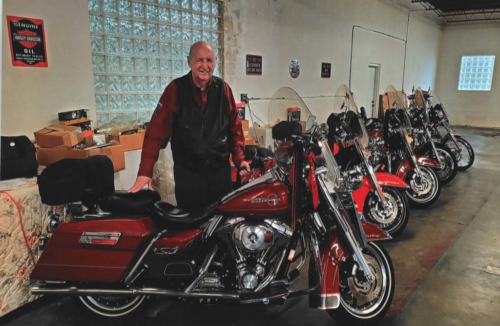 Mr. Freedle with his motorcycle collection.