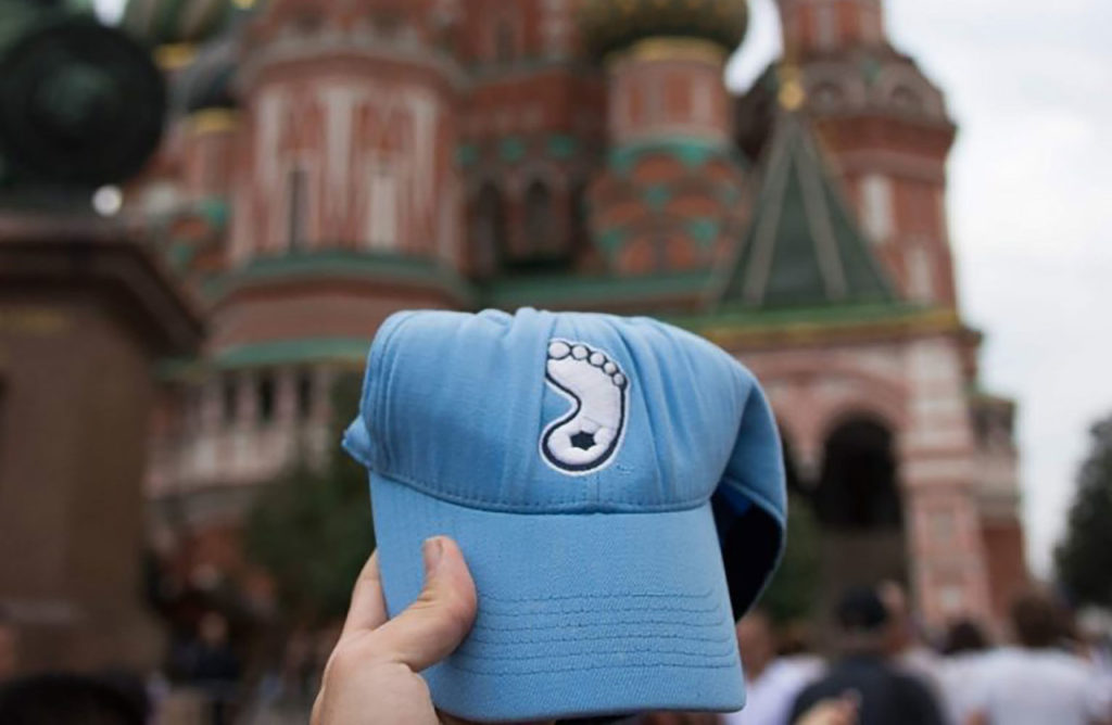 Tar Heel hat in front of St. Basil's Cathedral.