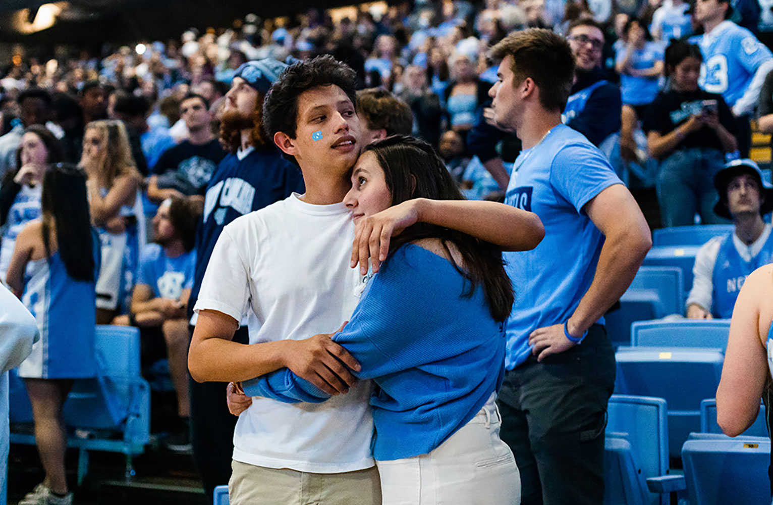 When the Tar Heels narrowly lost 72-69, fans quietly began to gather their belongings with resignation, then paused to listen as James Taylor’s “Carolina in my Mind” played on the stadium’s speakers. (Photo by Sarah Wood/UNC-Chapel Hill)
