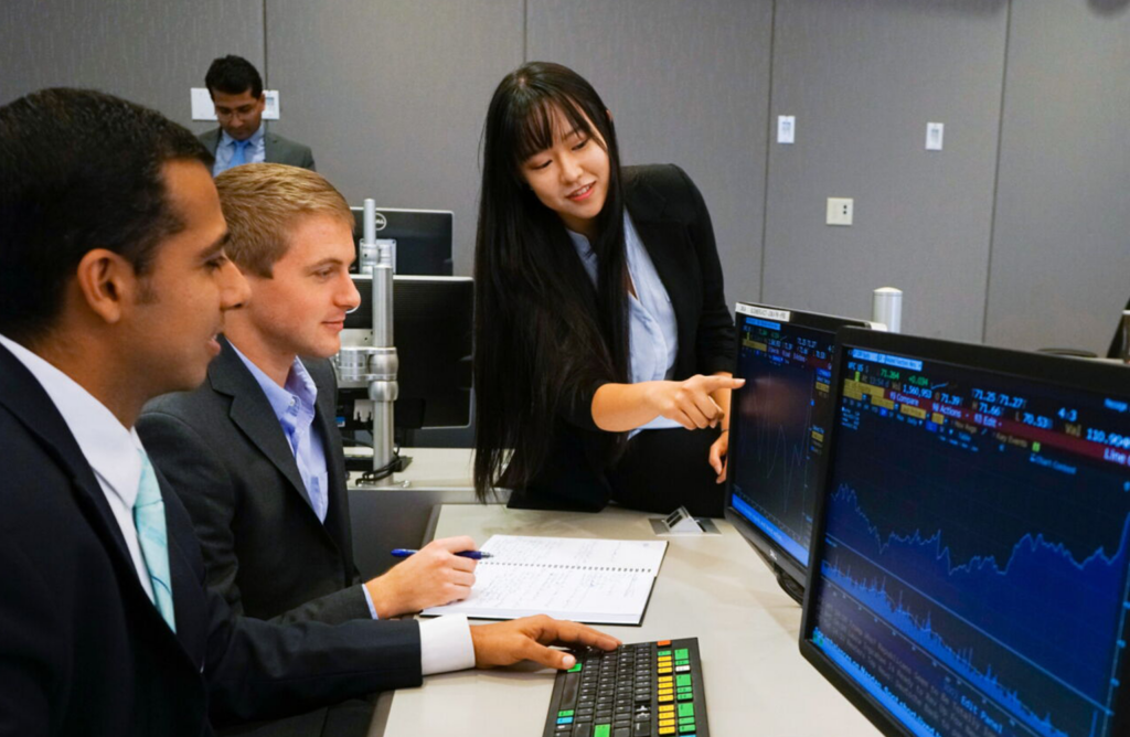 Students work in a lab for the Center for Excellence in Investment Management